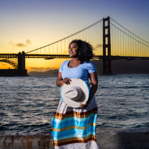 A woman in a colorful skirt